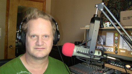 2-The-author-does-his-show-with-Electro-Voice-RE-20-mic